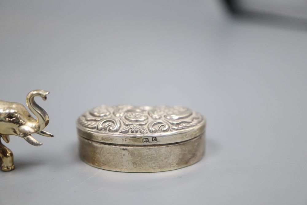 An Edwardian silver mounted hatching chick pin cushion, etc.